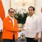 Foto: Ketua DPW PSI Bali I Nengah Yasa Adi Susanto alias Jro Ong (kiri) bersama Presiden RI Joko Widodo (kanan). Sumber: Dok Pribadi.